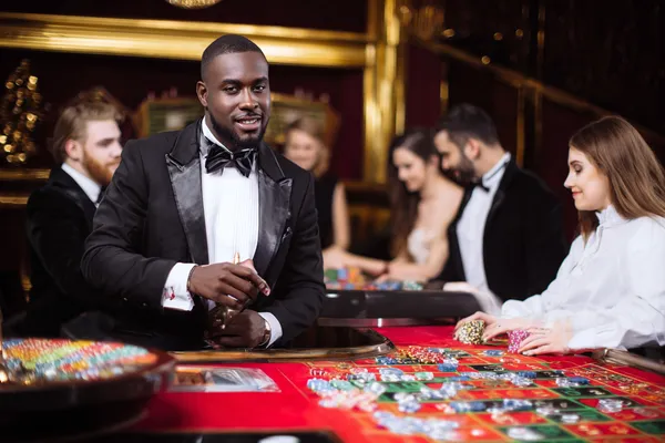 BB444 Jackpot Slots — Spin for massive rewards A dramatic shot of winning sevens landing on a slot reel surrounded by shining gold coins, symbolizing big wins.